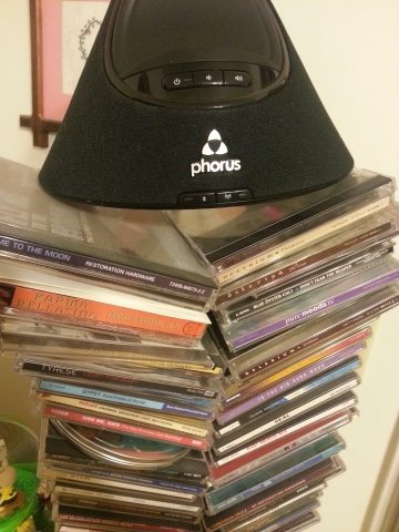 PS1 on stack of CDs